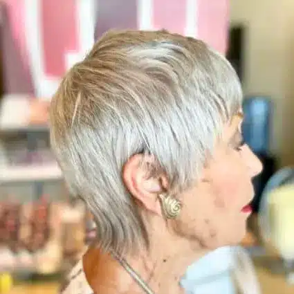 34 Elegant Short Hairstyles for Women Over 70 with Fine Hair 5 Layered Pixie With a Tapered Back for women over 70 with fine hair