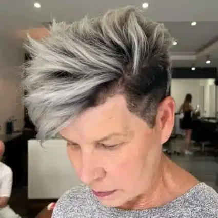 Sculpted High-Volume Silver Pixie With Shaved Sides And Dark Roots hairstyle