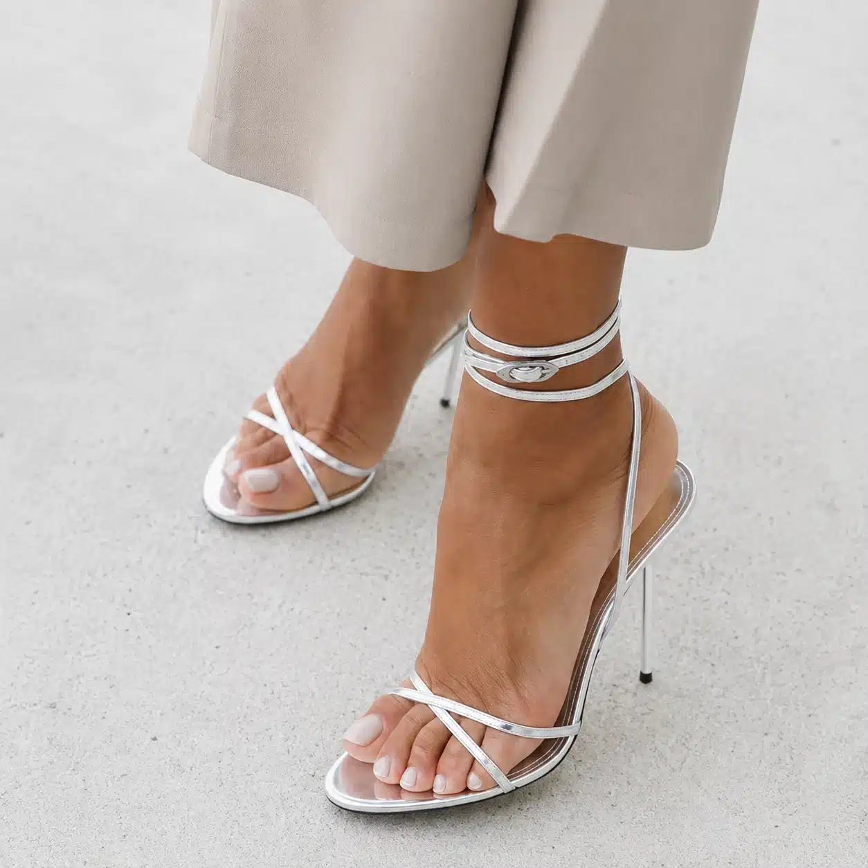 Milky White Pedicure: 11 Soft, Glossy Toe Ideas 2 Milky white pedicure styled with white sandals