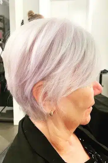 30+ Radiant Short Hairstyles for Women Over 70 With Fine Hair 26 Luminous Layered Crop hairstyle