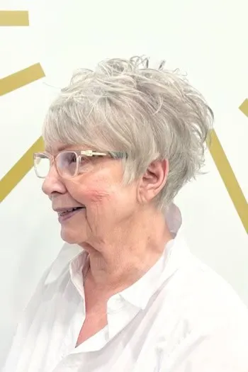 30+ Radiant Short Hairstyles for Women Over 70 With Fine Hair 34 Soft-Tousled Pixie With Bangs hairstyle