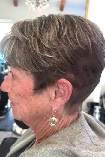 Polished Short Layered Pixie With Highlights and Bangs hairstyle
