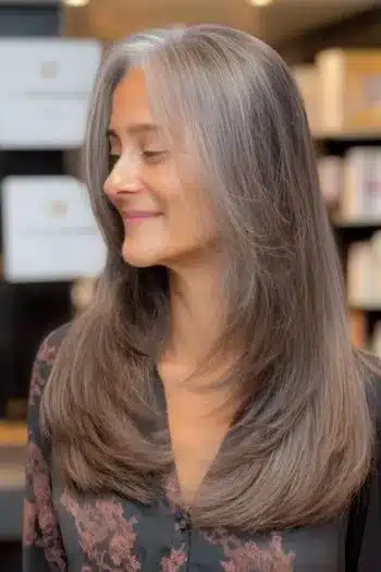 A modern butterfly haircut on fine hair, included in 30 inspiring long hairstyles for women over 50 with fine hair.