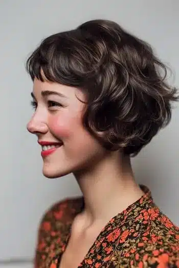 31 Bixie Haircuts That Blend Bob Shape with Pixie Ease 13 Retro Wavy Bixie with Baby Bangs — bixie haircuts