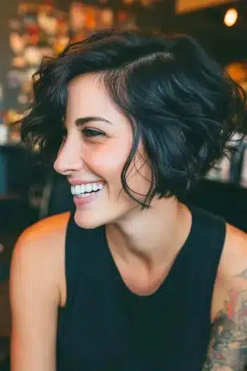 31 Bixie Haircuts That Blend Bob Shape with Pixie Ease 16 Voluminous Wavy Bixie — bixie haircuts