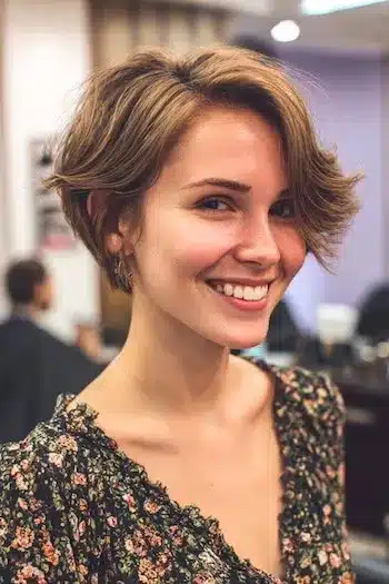 31 Bixie Haircuts That Blend Bob Shape with Pixie Ease 18 Swoopy Layered Bixie with Flipped Ends — bixie haircuts