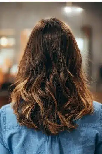 31 Gorgeous Haircuts in Your 30s That Feel Fresh and Modern 6 Tousled highlighted waves from 31 Gorgeous Haircuts That Look Even Better In Your 30s