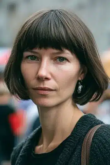 31 Hairstyles With Bangs That Prove A Little Fringe Goes A Long Way 32 Classic bob paired with a straight fringe, highlighting the 31 Hairstyles With Bangs That Prove A Little Fringe Goes A Long Way - Parisfy