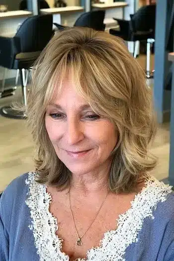 Voluminous mid-length shag with root lift