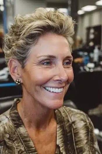 Textured pixie cut with added volume at the crown