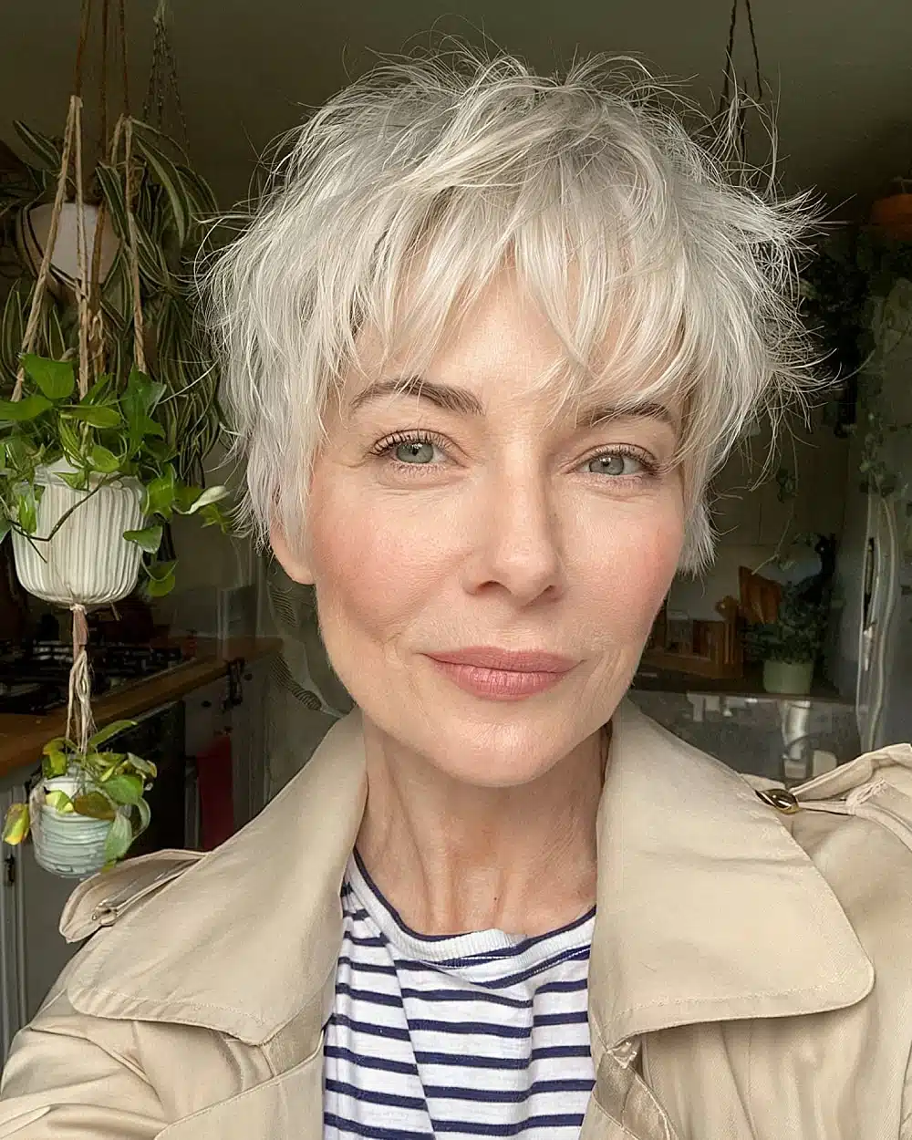 Textured shaggy pixie cut with choppy layers and wispy bangs for stylish women over 50, showcasing 20+ youthful shaggy hairstyles women over 50 are wearing in 2026