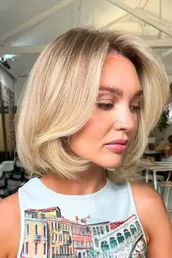 30 Trending Old Money Bob Haircuts With A Quiet Luxury Aesthetic 12 Softly layered blonde bob, showcasing the 30 Trending Old Money Bob Haircuts With A Quiet Luxury Aesthetic - Parisfy.
