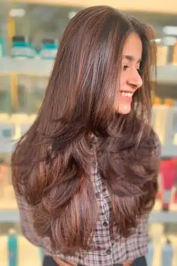31 Butterfly Haircut Ideas For The Perfect Layered Hairstyle 18 Long feathered butterfly layers with soft, flowing movement