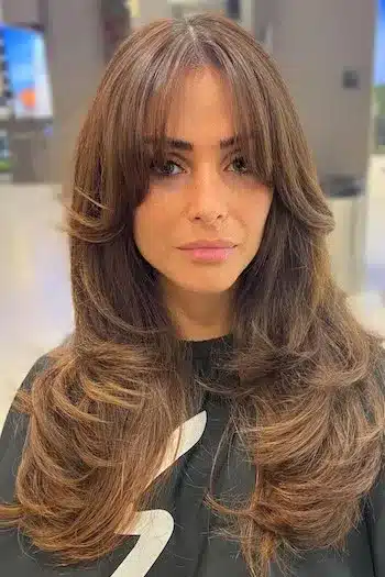 31 Butterfly Haircut Ideas For The Perfect Layered Hairstyle 22 Subtle layered butterfly haircut with gentle movement and natural flow