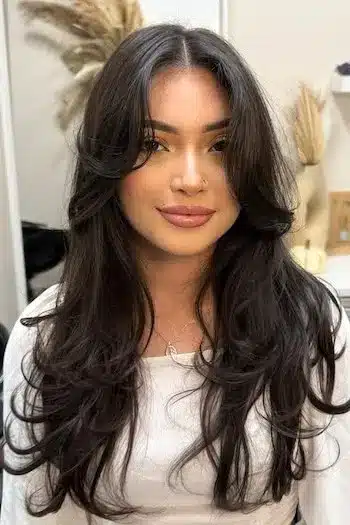 31 Butterfly Haircut Ideas For The Perfect Layered Hairstyle 26 Soft waves butterfly cut with romantic layers and flowing movement