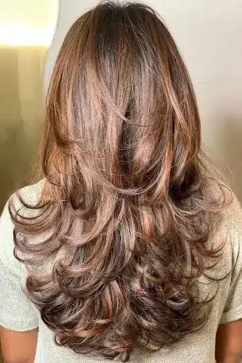 31 Butterfly Haircut Ideas For The Perfect Layered Hairstyle 7 Caramel-highlighted butterfly haircut with warm dimension and flowing layers