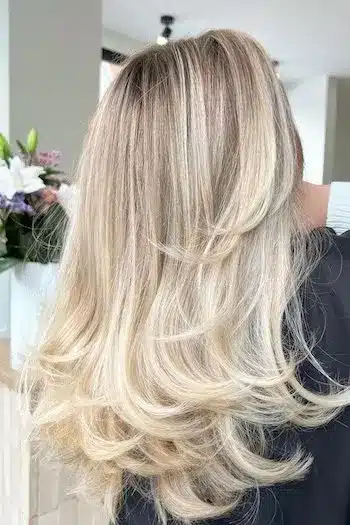 31 Butterfly Haircut Ideas For The Perfect Layered Hairstyle 9 Blonde butterfly cut for thick hair with voluminous, lightweight layers