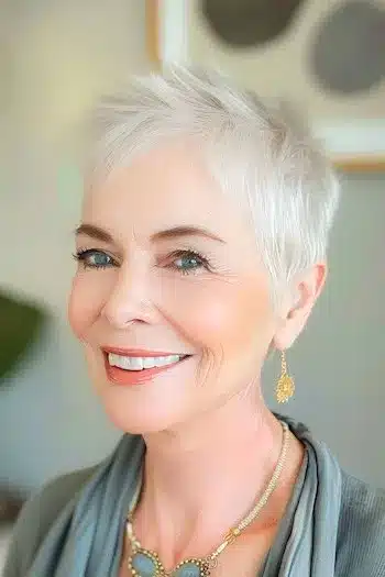 Grown-out layered pixie for thin hair with wispy gray strands