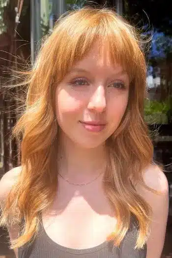32 Fresh Summer Haircuts You’ll Want To Try This Season 12 Soft waves with wispy bangs and warm copper tones