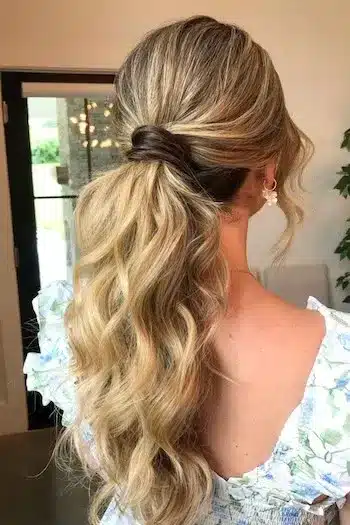 32 Fresh Summer Haircuts You’ll Want To Try This Season 20 Long wavy ponytail with a wrapped hair base