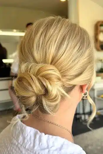32 Fresh Summer Haircuts You’ll Want To Try This Season 26 Elegant low bun with a smooth, refined finish