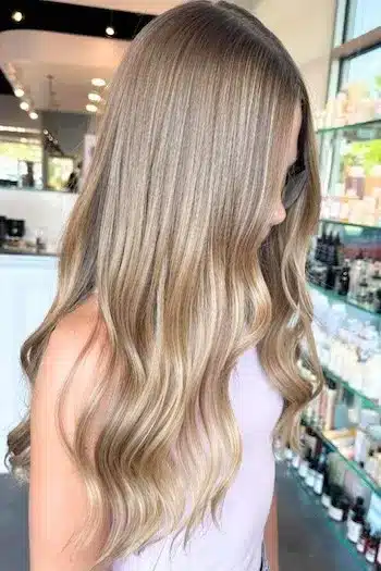 32 Fresh Summer Haircuts You’ll Want To Try This Season 27 Long loose waves with hand-painted balayage coloring