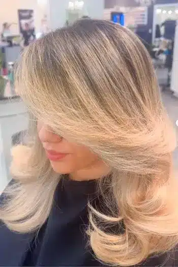 32 Fresh Summer Haircuts You’ll Want To Try This Season 5 Feathered highlighted layers with a retro-inspired soft finish