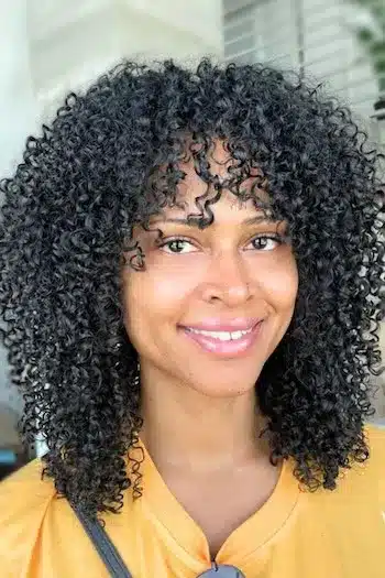 32 Fresh Summer Haircuts You’ll Want To Try This Season 10 Curly long bob with soft bangs and playful texture