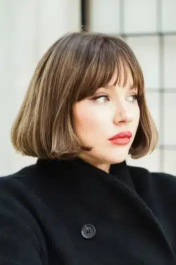 Full textured French bob on a woman with brown hair