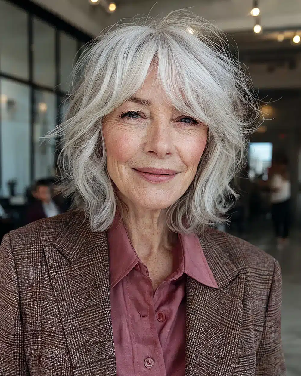 Layered shag with flipped out ends for volume on thin gray hair, included in 50 pretty shag haircuts for thin hair women over 70 swear make them look younger