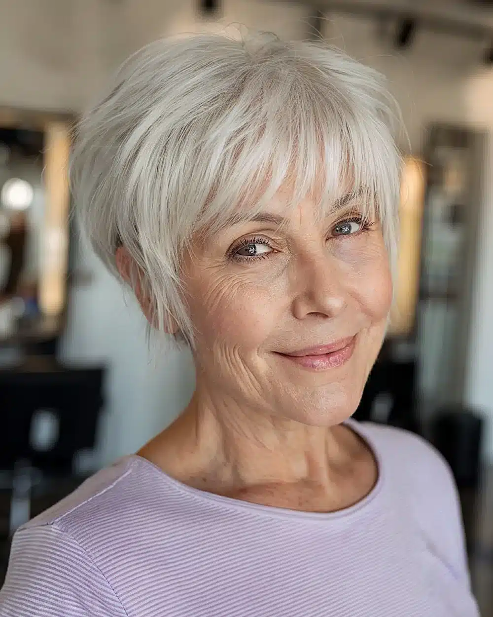 Feathered pixie shag cut with textured crown for thin hair, featured in 50 pretty shag haircuts for thin hair women over 70 swear make them look younger