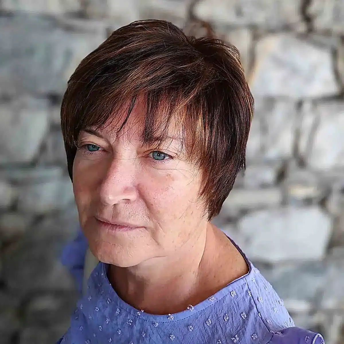 51 Cutest Wash and Wear Haircuts for Women Over 50 29 Easy-Styling Straight Short Hair with Wispy Bangs for Women Over 50