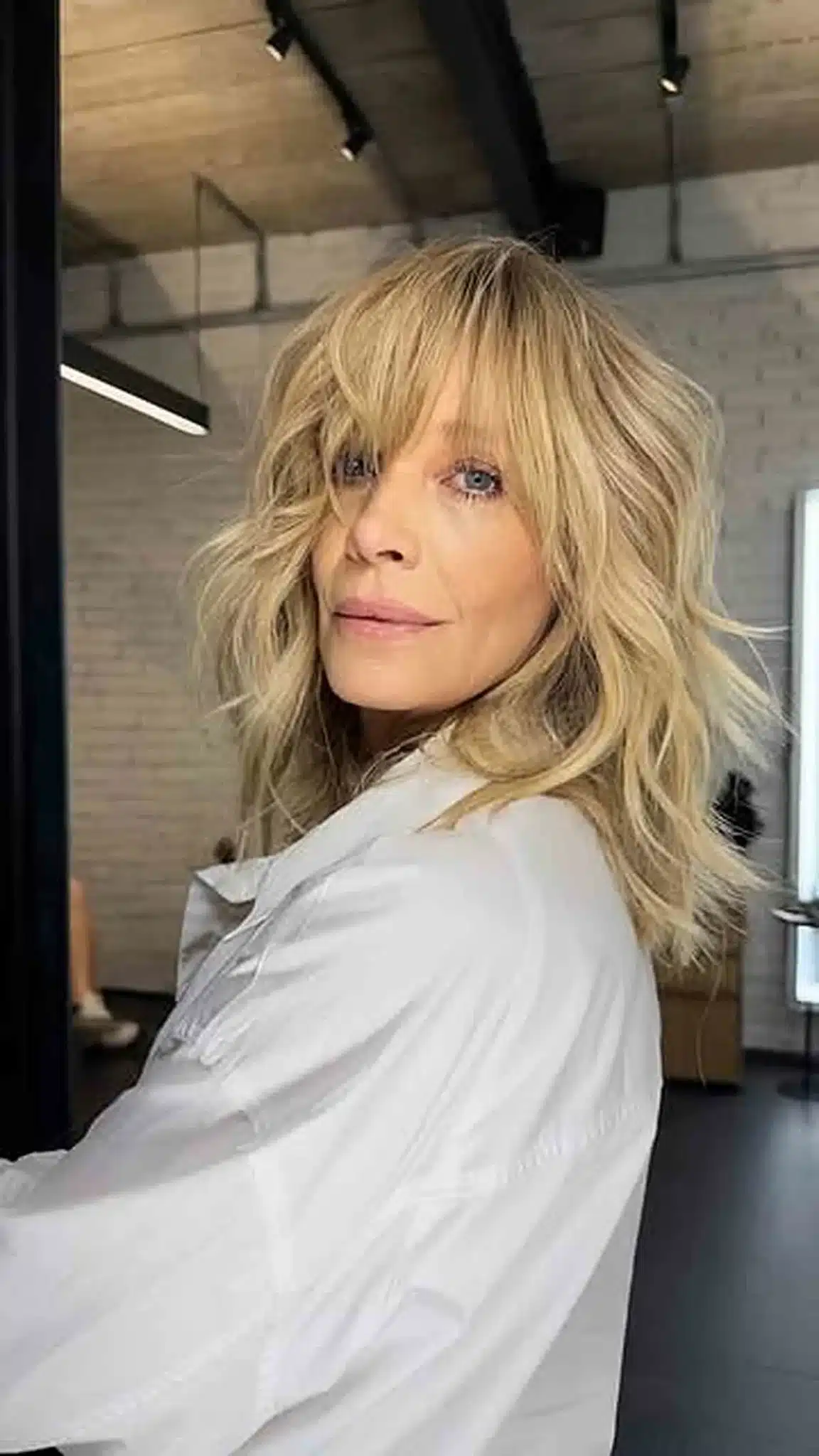 51 Modern Medium Shaggy Hairstyles Women Over 60 Can Pull Off 1 Textured medium-length cut with soft bangs, a top pick from 51 Modern Medium Shaggy Hairstyles Women Over 60 Can Pull Off