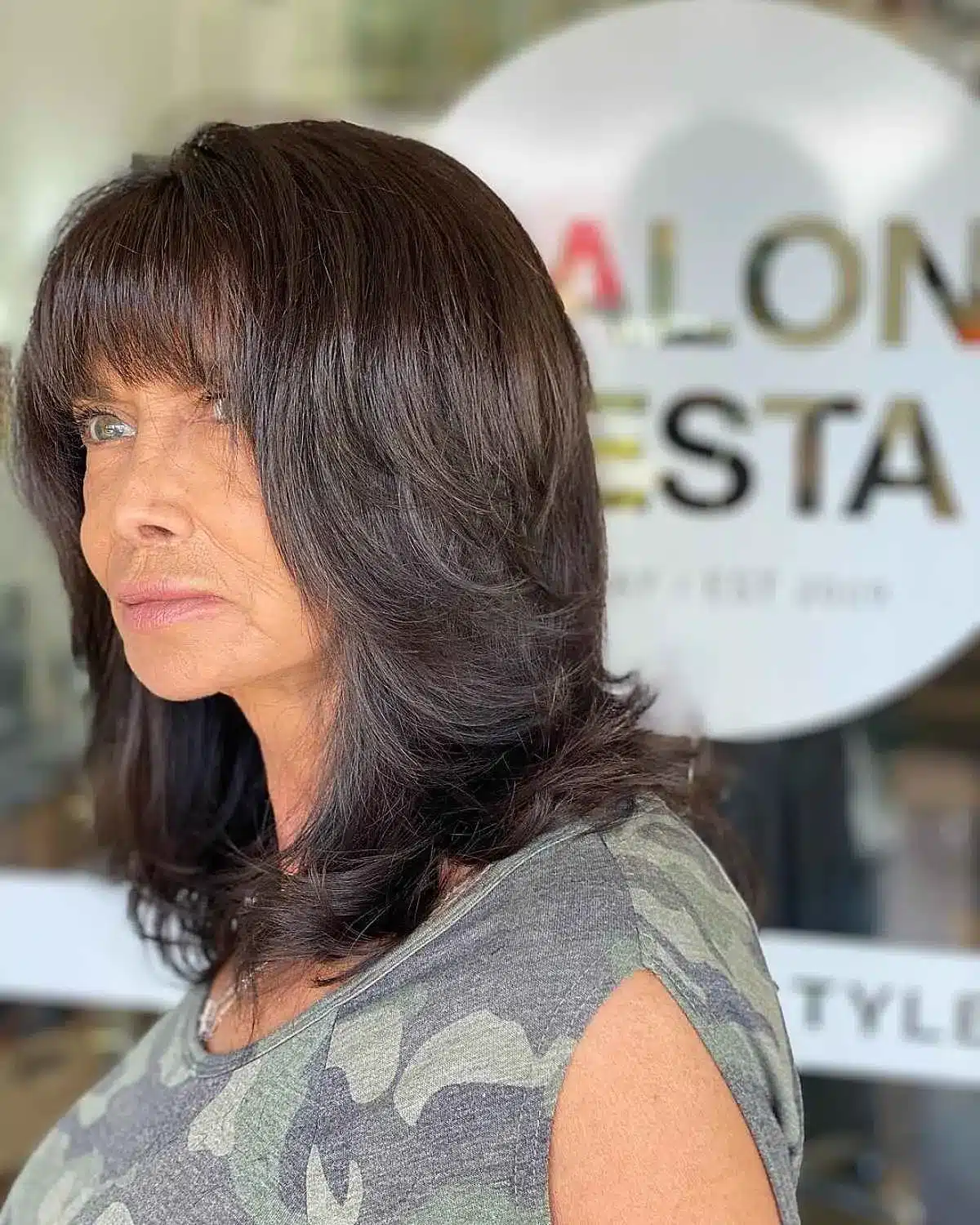 51 Modern Medium Shaggy Hairstyles Women Over 60 Can Pull Off 42 Chocolate shag with rounded bangs for ladies over 60 from 51 Modern Medium Shaggy Hairstyles Women Over 60 Can Pull Off