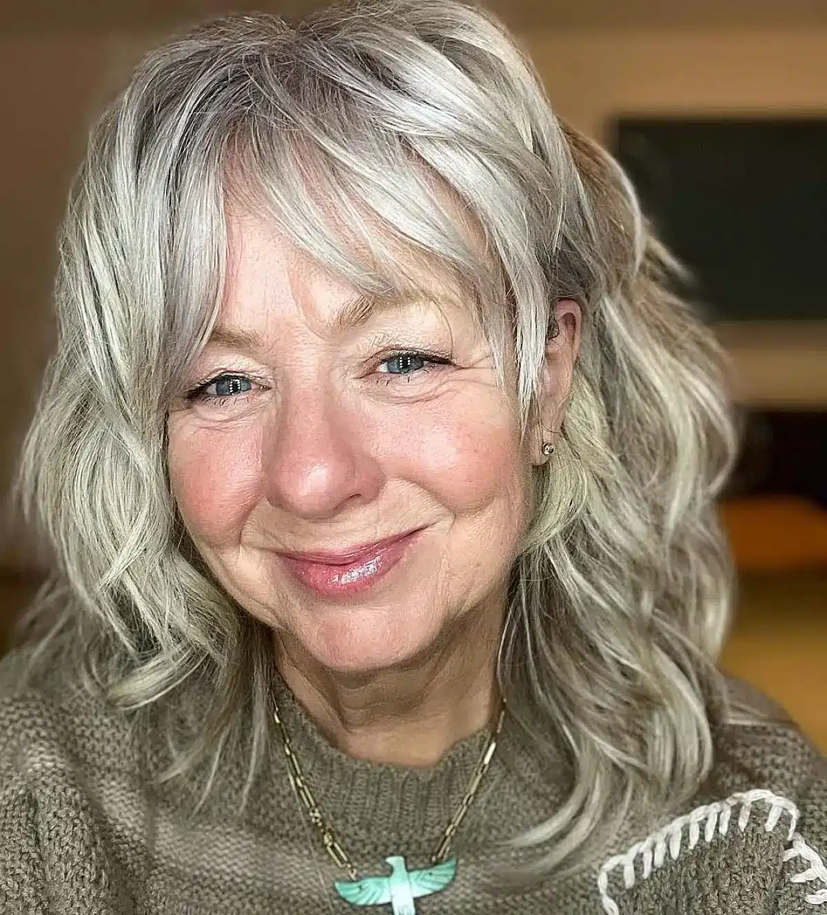 51 Modern Medium Shaggy Hairstyles Women Over 60 Can Pull Off 43 Mullet shag with a soft fringe for wavy hair, featured in 51 Modern Medium Shaggy Hairstyles Women Over 60 Can Pull Off