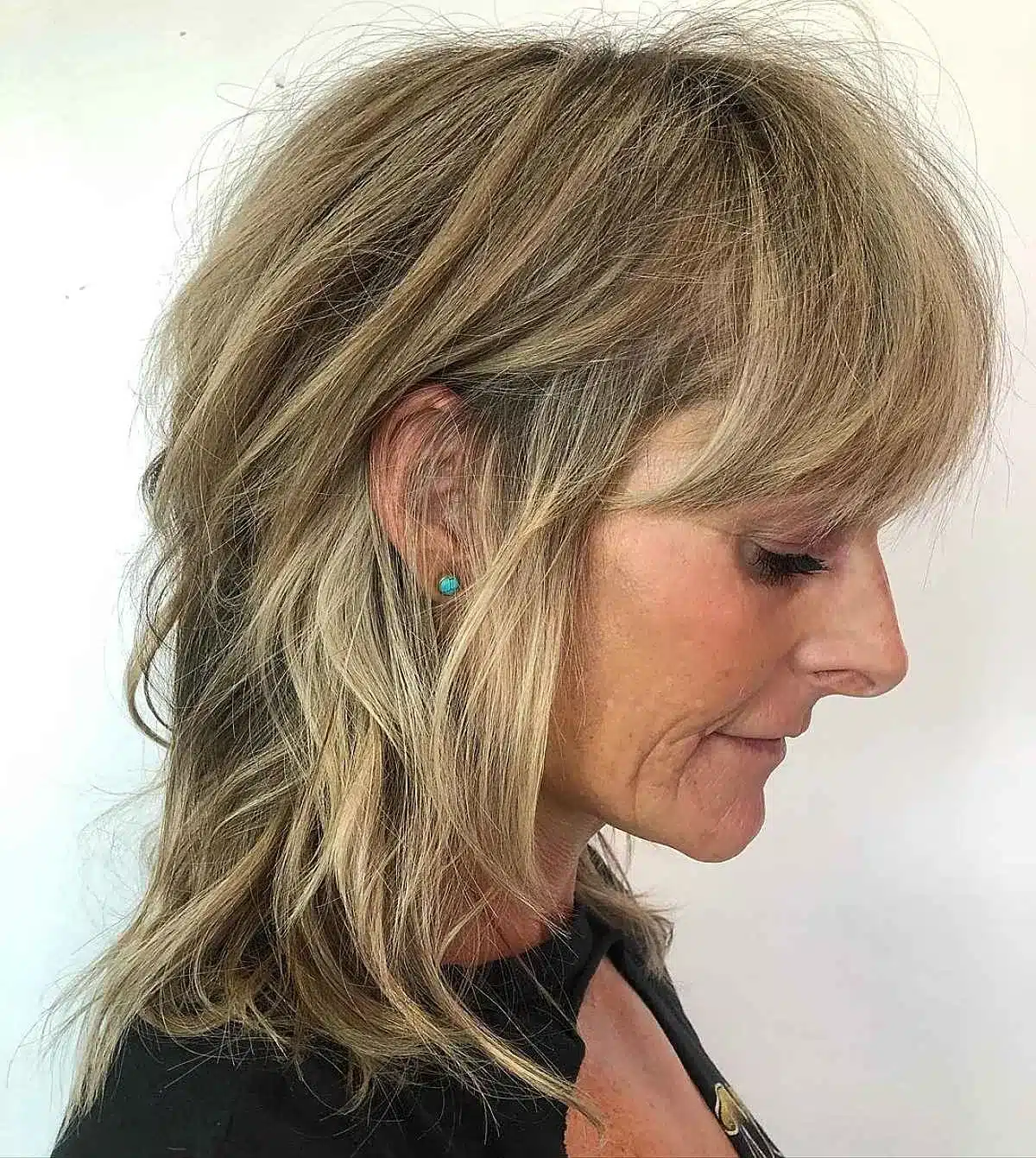 51 Modern Medium Shaggy Hairstyles Women Over 60 Can Pull Off 46 Razored shag with a tousled texture for older ladies over sixty from 51 Modern Medium Shaggy Hairstyles Women Over 60 Can Pull Off