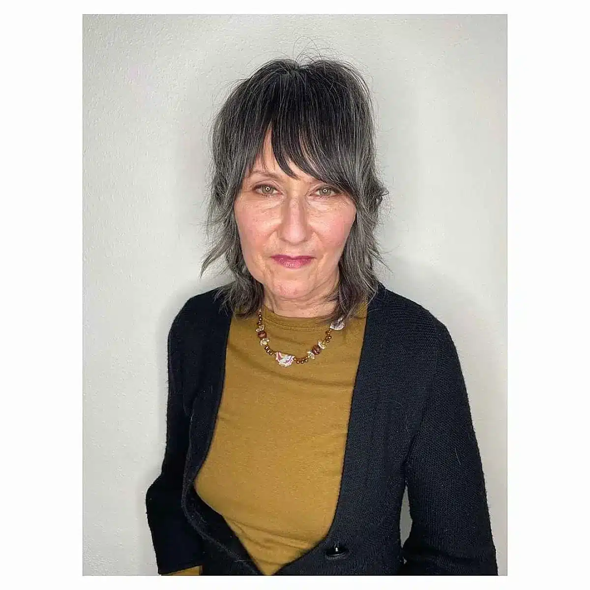 51 Modern Medium Shaggy Hairstyles Women Over 60 Can Pull Off 49 Collarbone-length shag with bangs for older ladies with thin hair, featured in 51 Modern Medium Shaggy Hairstyles Women Over 60 Can Pull Off