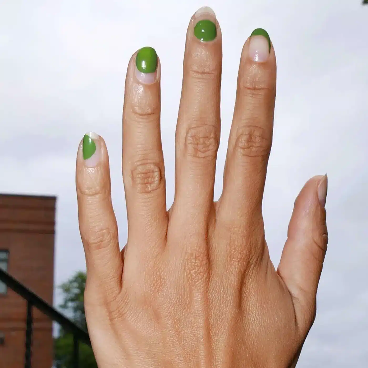 18 Olive Green Nail Ideas for an Unexpected Spring Manicure 11 Abstract olive green shapes on clear nails