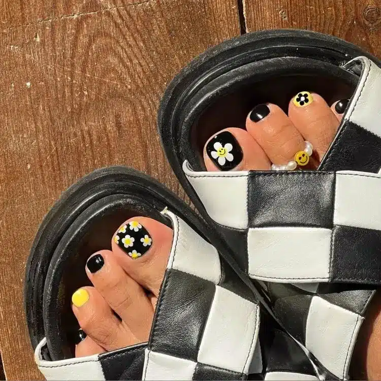 39 Cute Pedicure Ideas for Every Season 28 Black yellow and daisy pedicure