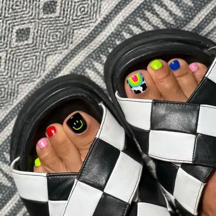 39 Cute Pedicure Ideas for Every Season 38 Rainbow pedicure with neon colors and mixed patterns